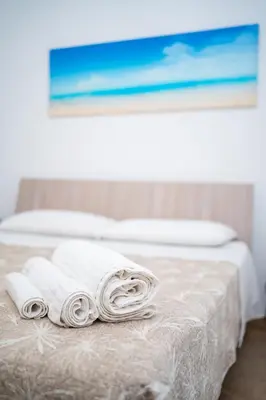 Letto o letti in una camera di Micalice's Sea House