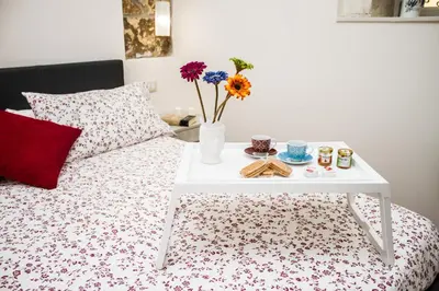 Letto o letti in una camera di Siracusa Houses K&S