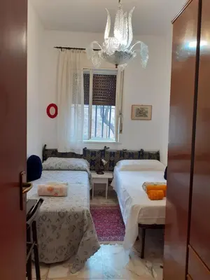 Letto o letti in una camera di CASA DEGLI OLEANDRI