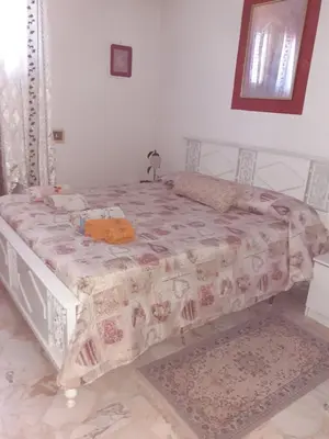 Letto o letti in una camera di CASA DEGLI OLEANDRI