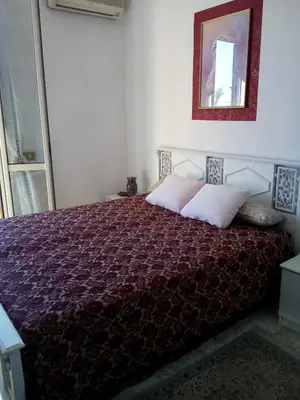 Letto o letti in una camera di CASA DEGLI OLEANDRI