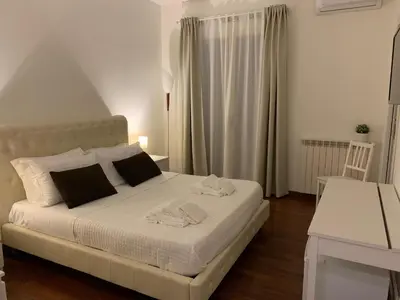 Letto o letti in una camera di BeB L'ALLORO