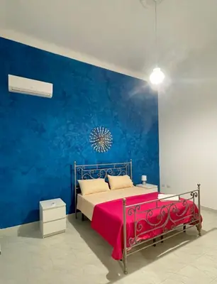 Letto o letti in una camera di Garibaldi 19
