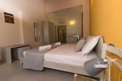 Letto o letti in una camera di Il sentiero dell'Itria - Camere con vista