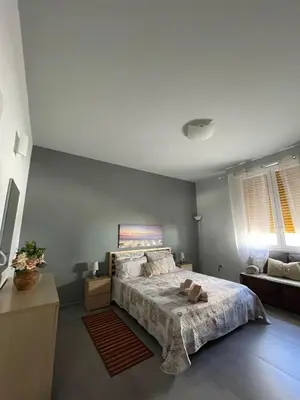 Letto o letti in una camera di Casa Mario