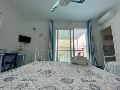 Letto o letti in una camera di Casa Campisi a 100 mt dal Mare Marzamemi