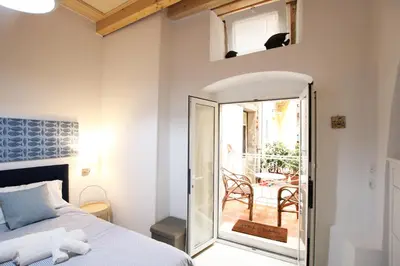 Letto o letti in una camera di Dream Suite in Ortigia