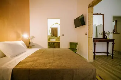 Letto o letti in una camera di Regina Elena Rooms