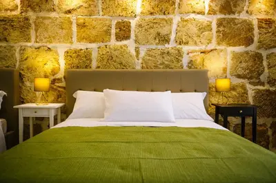 Letto o letti in una camera di Regina Elena Rooms