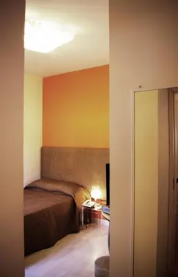 Letto o letti in una camera di La Piccola Locanda