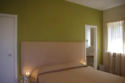 Letto o letti in una camera di La Piccola Locanda