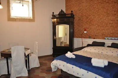 Letto o letti in una camera di DIMORA EPODE'