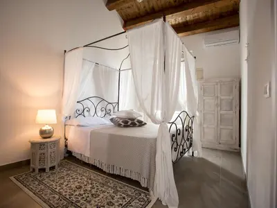 Letto o letti in una camera di Ortigia Boutique Palace
