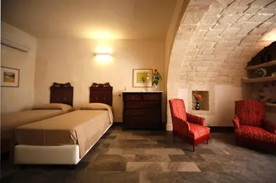 Letto o letti in una camera di Hotel Dell'Orologio