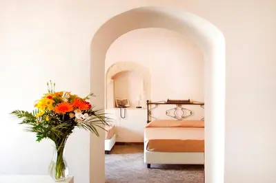 Letto o letti in una camera di Hotel Dell'Orologio