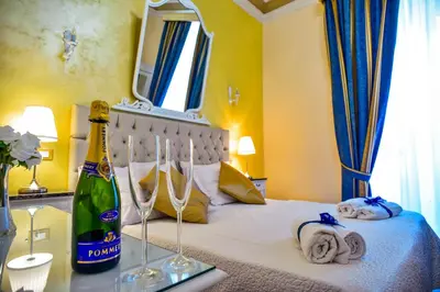 Letto o letti in una camera di Palazzo degli Affreschi
