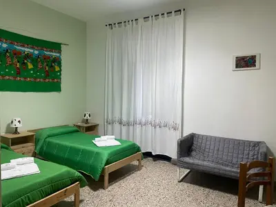 Letto o letti in una camera di Beteyà Hostel Don Bosco