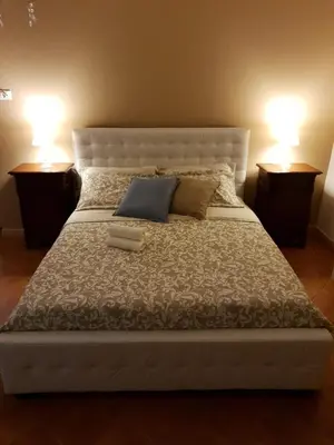 Letto o letti in una camera di La Casa di Manu Ortigia