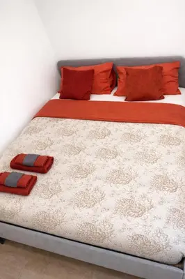 Letto o letti in una camera di Recanto Do Sol Apartment