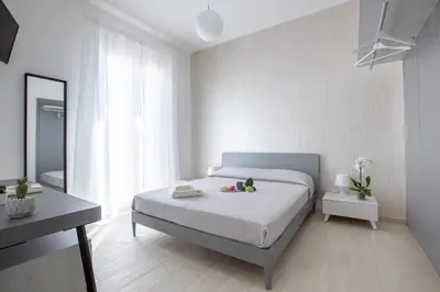 Letto o letti in una camera di Aruci b&b