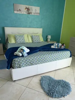 Letto o letti in una camera di Light Blue Room