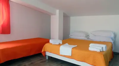 Letto o letti in una camera di Casa Vacanza Miramare