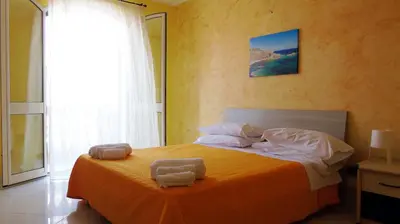 Letto o letti in una camera di Casa Vacanza Miramare