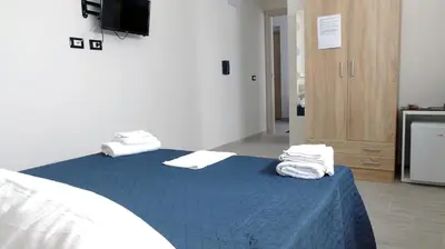 Letto o letti in una camera di Casa Vacanza Miramare
