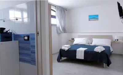 Letto o letti in una camera di Casa Vacanza Miramare
