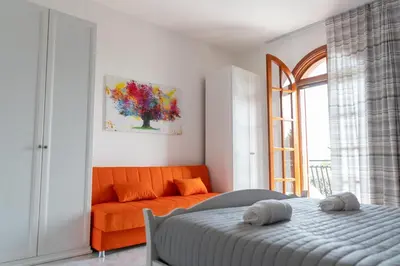 Letto o letti in una camera di Villa Mafalda Relax Apartment