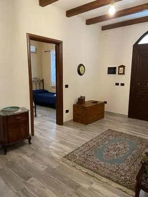 Letto o letti in una camera di Strelitzia's house with heated pool , private garden and private parking & wi-fi