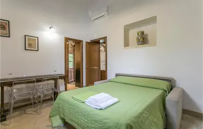 Letto o letti in una camera di Tenuta Santa Lucia