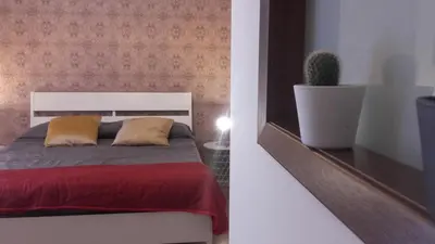Letto o letti in una camera di The Core - Prime Flat Catania Duomo