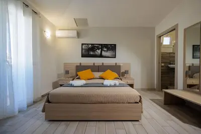 Letto o letti in una camera di Fuori Rotta