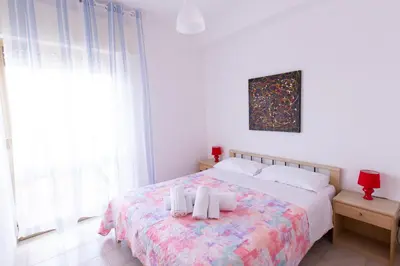 Letto o letti in una camera di Villa Marina - San Lorenzo