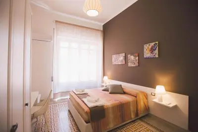 Letto o letti in una camera di Residenza Macos one