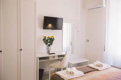 Letto o letti in una camera di Residenza Macos one