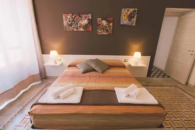 Letto o letti in una camera di Residenza Macos one