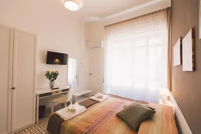 Letto o letti in una camera di Residenza Macos one