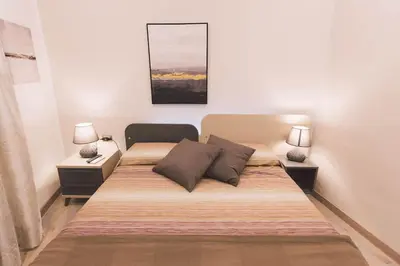 Letto o letti in una camera di Residenza Macos