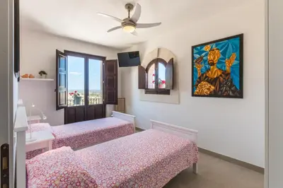 Letto o letti in una camera di Trappeto Dellago with sea view, pool, parking & wi-fi