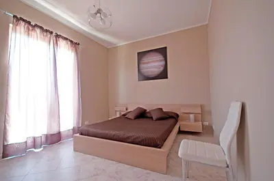 Letto o letti in una camera di Kosmos