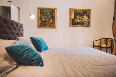 Letto o letti in una camera di Suites of the Royal Council