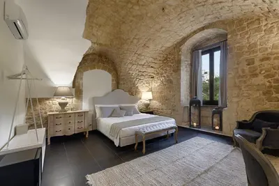 Letto o letti in una camera di Itria Palace