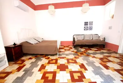 Letto o letti in una camera di casa e putia