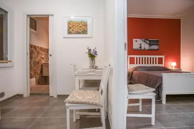 Letto o letti in una camera di La Finestra Sul Castello - Modica Panoramic Flats