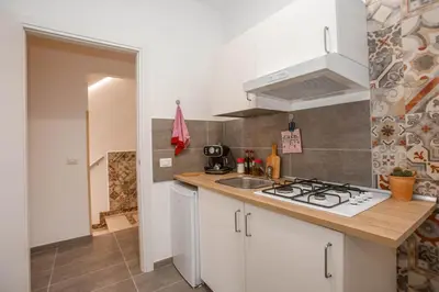 Cucina o angolo cottura di La Finestra Sul Castello - Modica Panoramic Flats