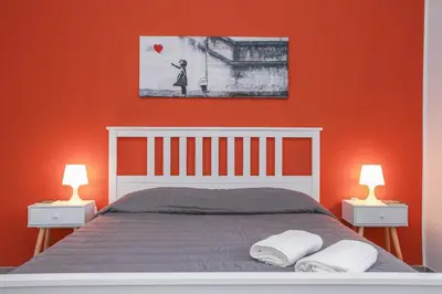 Letto o letti in una camera di La Finestra Sul Castello - Modica Panoramic Flats