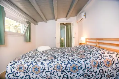 Letto o letti in una camera di La Finestra Sul Castello - Modica Panoramic Flats