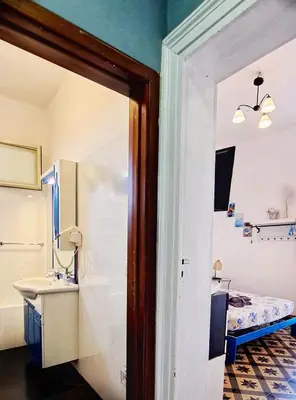 Letto o letti in una camera di Stella del Sud